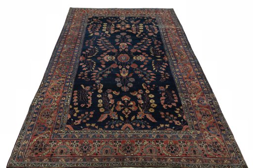 Surface texture of 1930s Sarough rug with natural Cork and intricate pattern