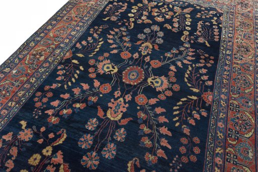 Backside of handmade 1930s Sarough rug showing knot structure and weave density