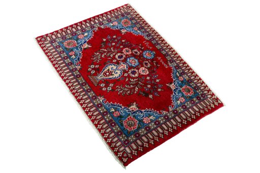 Corner detail of 2000s Sarough rug showing border pattern and Wool pile