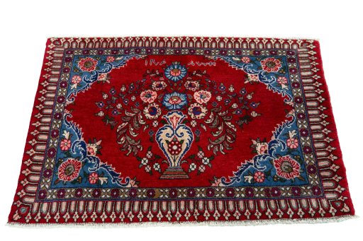 Surface texture of 2000s Sarough rug with natural Wool and intricate pattern
