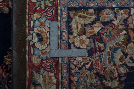 Backside of handmade 2000s Sarough rug showing knot structure and weave density