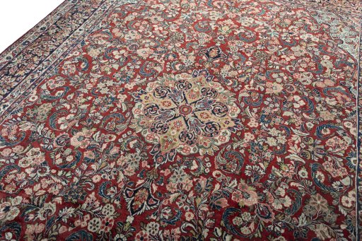 Backside of handmade 1950s Sarough rug showing knot structure and weave density