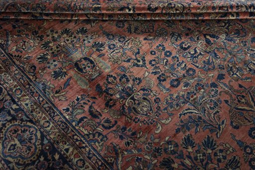 Surface texture of 1930s Sarough rug with natural Cork and intricate pattern