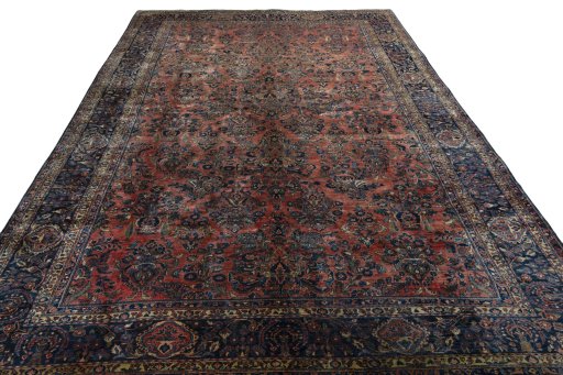 Surface texture of 1930s Sarough rug with natural Cork and intricate pattern