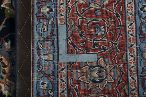 Backside of handmade 2000s Sarough rug showing knot structure and weave density