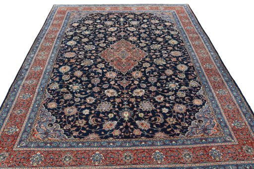 Surface texture of 2000s Sarough rug with natural Wool and intricate pattern