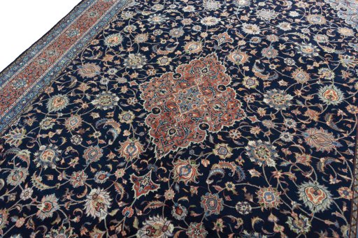 Backside of handmade 2000s Sarough rug showing knot structure and weave density