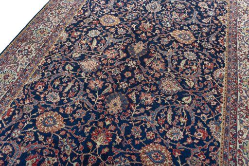 Backside of handmade 1970s Sarough rug showing knot structure and weave density