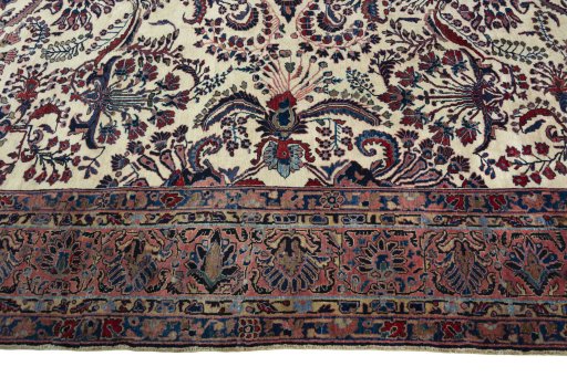 Corner detail of 1930s Sarough rug showing border pattern and Cork pile