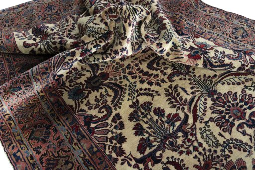 Surface texture of 1930s Sarough rug with natural Cork and intricate pattern