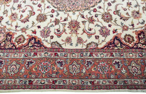 Corner detail of 2000s Sarough rug showing border pattern and Wool pile