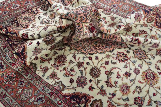 Surface texture of 2000s Sarough rug with natural Wool and intricate pattern