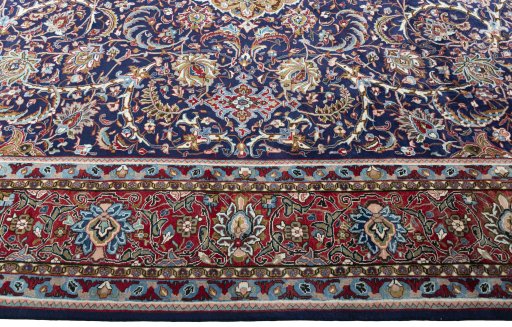Corner detail of 1970s Sarough rug showing border pattern and Wool pile