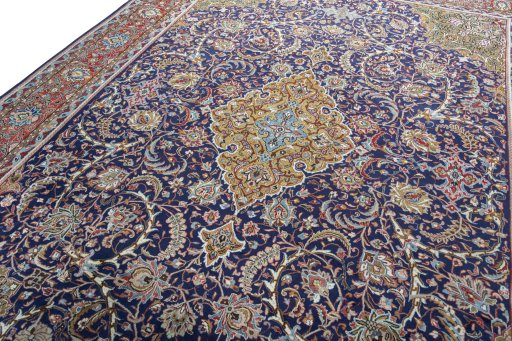 Backside of handmade 1970s Sarough rug showing knot structure and weave density
