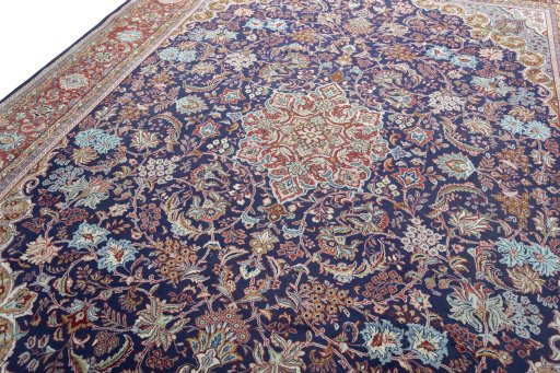 Backside of handmade 1970s Sarough rug showing knot structure and weave density