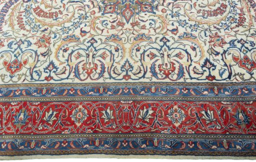 Corner detail of New Sarough rug showing border pattern and Cork pile