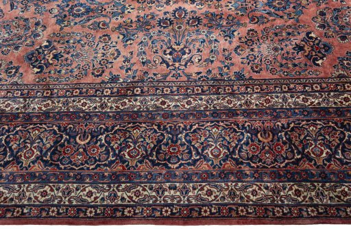 Corner detail of 1930s Sarough rug showing border pattern and Cork pile