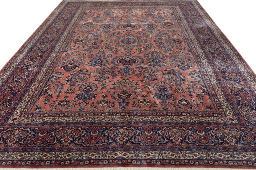 Surface texture of 1930s Sarough rug with natural Cork and intricate pattern