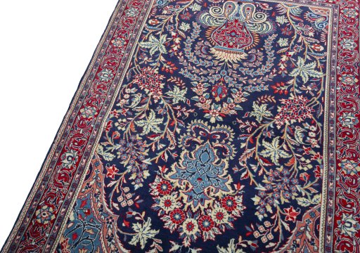 Backside of handmade New Sarough rug showing knot structure and weave density