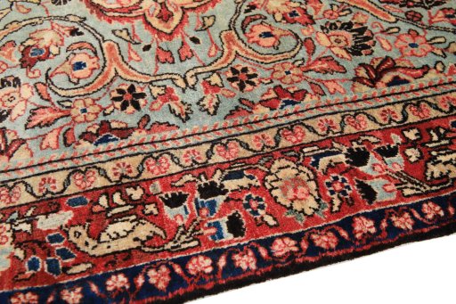 Backside of handmade 1990s Sarough rug showing knot structure and weave density