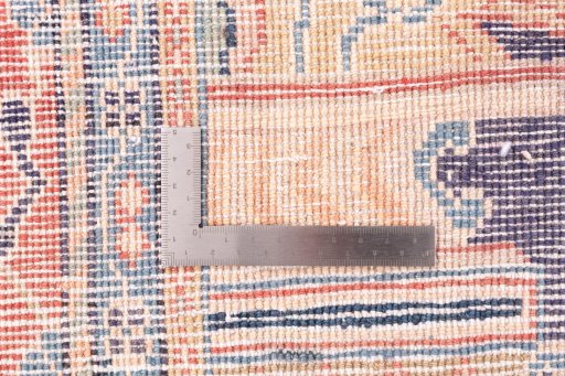 Close-up detail of 2000s Sarough rug from Iran / Persia showing Wool weave