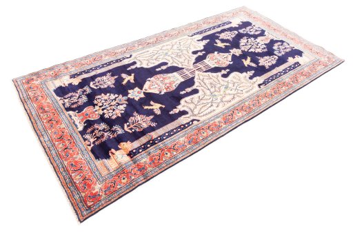 Corner detail of 2000s Sarough rug showing border pattern and Wool pile