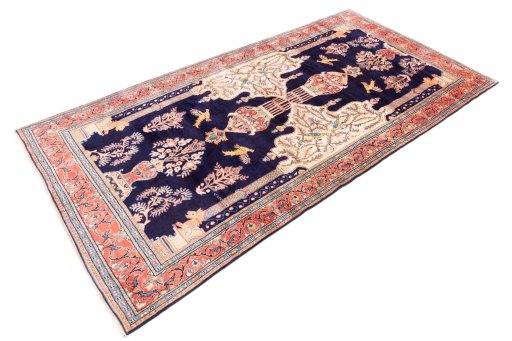 Close-up detail of 2000s Sarough rug from Iran / Persia showing Wool weave