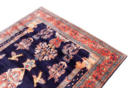Surface texture of 2000s Sarough rug with natural Wool and intricate pattern
