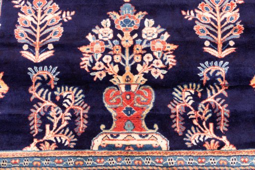 Close-up detail of 2000s Sarough rug from Iran / Persia showing Wool weave