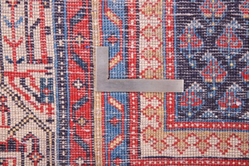 Corner detail of 1990s Sarough rug showing border pattern and Wool pile