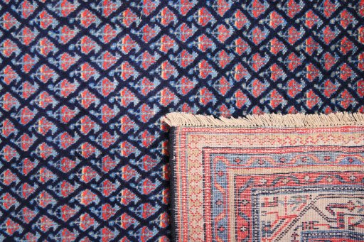 Close-up detail of 1990s Sarough rug from Iran / Persia showing Wool weave