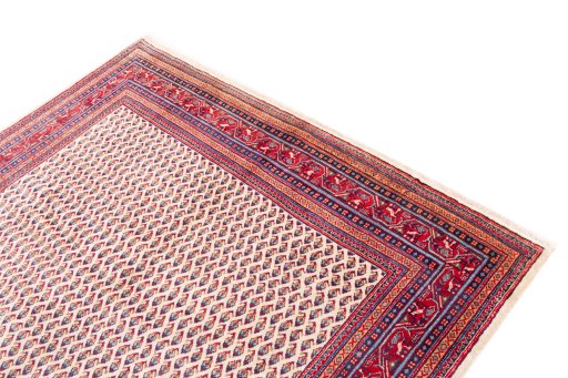 Surface texture of 1975s Sarough rug with natural Wool and intricate pattern