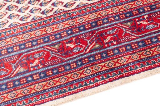 Backside of handmade 1975s Sarough rug showing knot structure and weave density