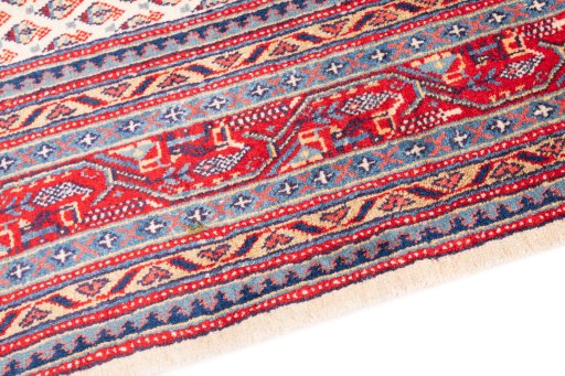Backside of handmade 1975s Sarough rug showing knot structure and weave density