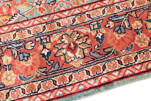 Backside of handmade 1975s Sarough rug showing knot structure and weave density