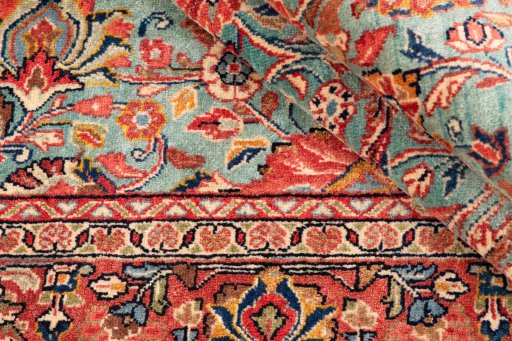 Corner detail of 1975s Sarough rug showing border pattern and Wool pile