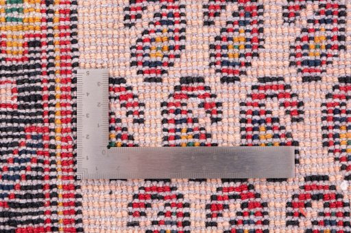 Corner detail of 1970s Sarough rug showing border pattern and Wool pile