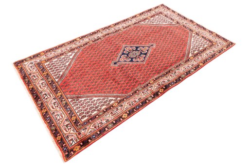 Corner detail of 1970s Sarough rug showing border pattern and Wool pile
