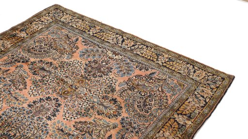 Surface texture of 1920s Sarough rug with natural Wool and intricate pattern