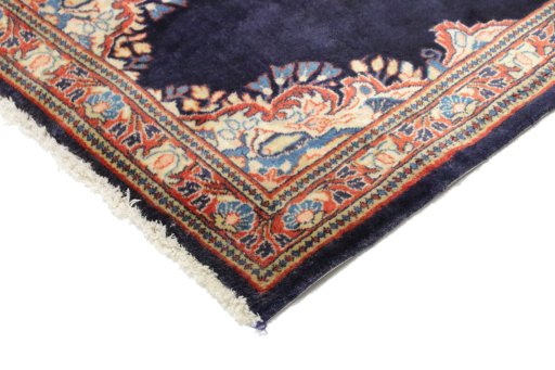 Backside of handmade 1990s Sarough rug showing knot structure and weave density