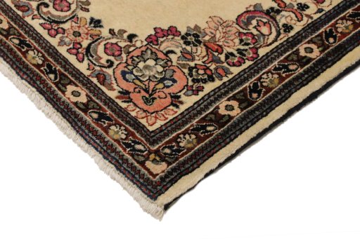 Backside of handmade New Sarough rug showing knot structure and weave density