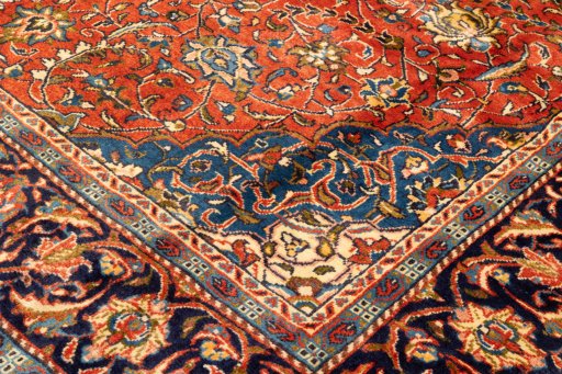 Backside of handmade New Sarough rug showing knot structure and weave density