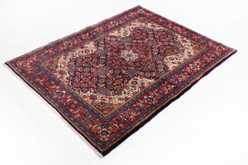 Corner detail of 1990s Sarough rug showing border pattern and Wool pile