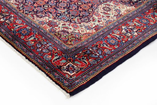 Backside of handmade 1990s Sarough rug showing knot structure and weave density