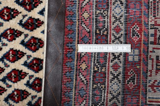 Surface texture of 2000s Sarough Mir rug with natural Wool and intricate pattern