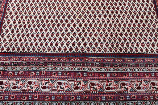 Backside of handmade 2000s Sarough Mir rug showing knot structure and weave density