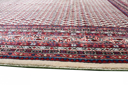 Close-up detail of 2000s Sarough Mir rug from Iran / Persia showing Wool weave