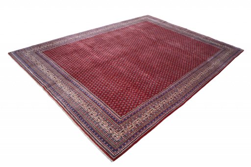 Corner detail of 2000s Sarough Mir rug showing border pattern and Wool pile