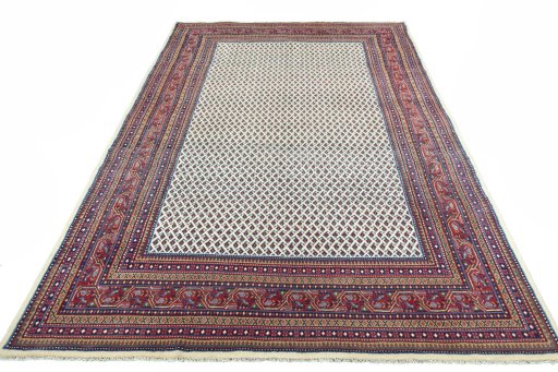 Surface texture of 2000s Sarough Mir rug with natural Wool and intricate pattern