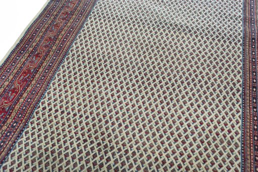 Backside of handmade 2000s Sarough Mir rug showing knot structure and weave density